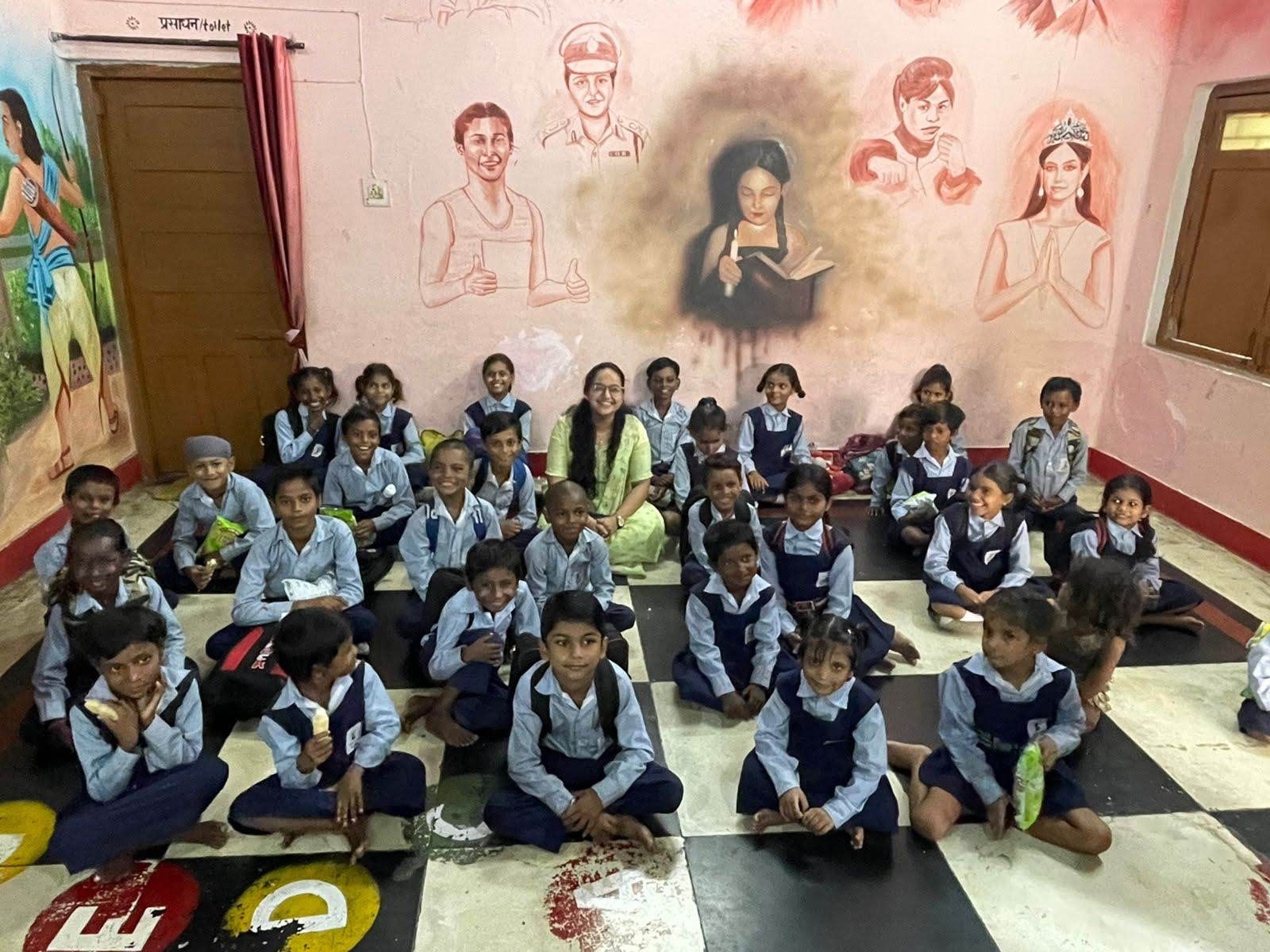 Triveni team members with schoolgirls supported through Shuruaat Ek Jyoti Siksha Ki